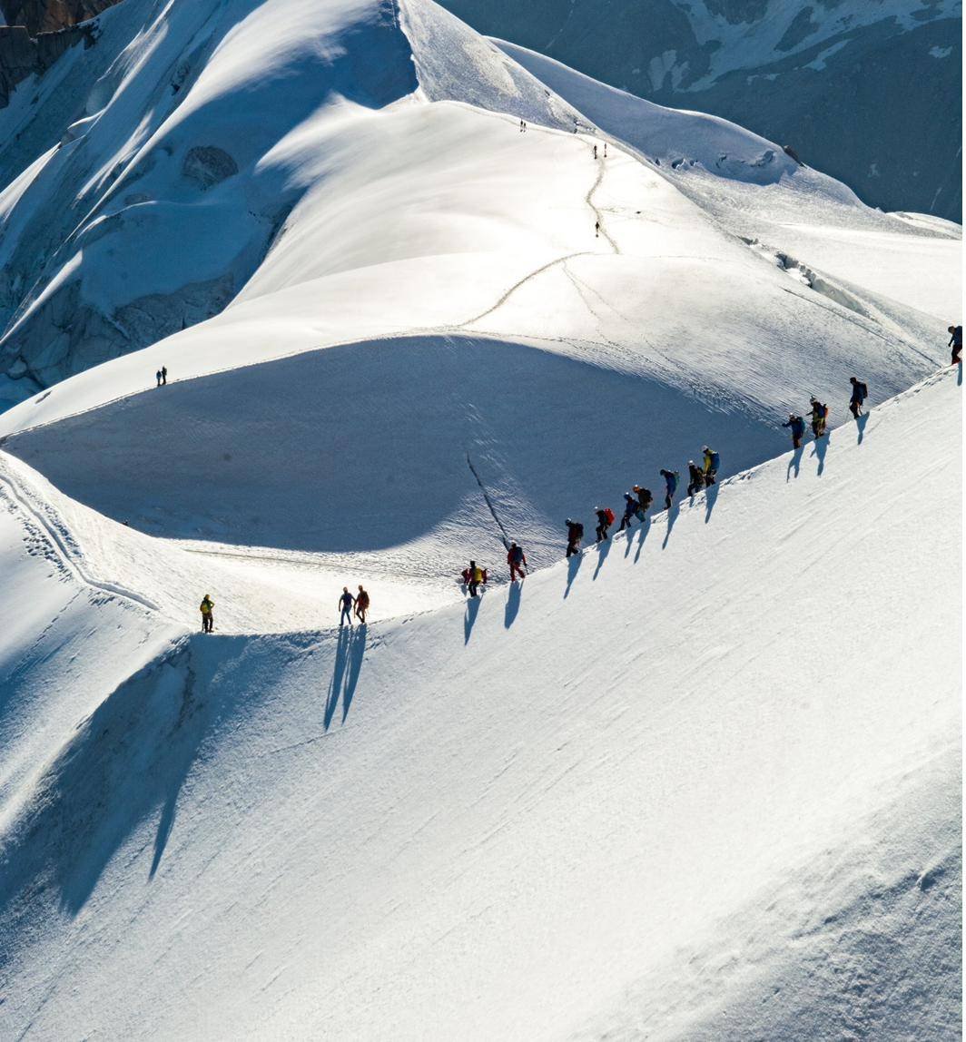 Climbers on a snow ridge